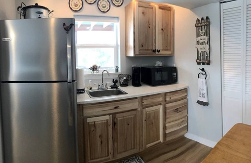 Briargate Apartment | NEW Bright & Sunny Comfort - Urban Farm Living!