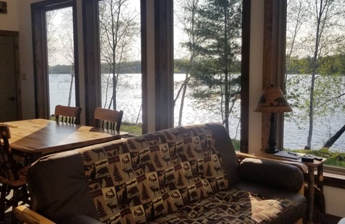 Phillips Cabin | New cabin with lake-facing windows on 400-acre Long Lake of the Phillips Chain.