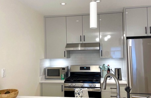 Riley Park House | NEW, clean, modern, private basement suite