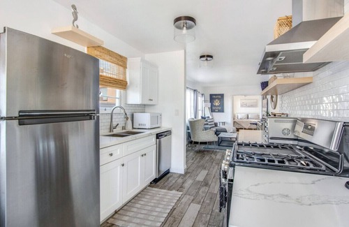 The Strand House | New | Clean | Steps To The Beach | Ocean Breeze!