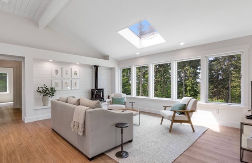 Freeland Cottage | New construction - upper-level home with expansive deck & orchard views