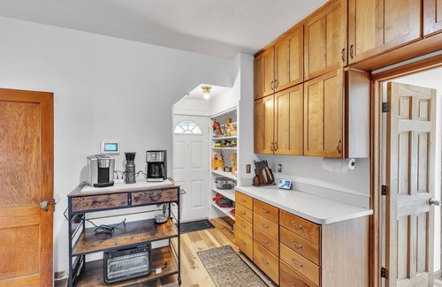 Garfield Heights House | NEW! Cozy Getaway with Hot Tub, Patio & Fenced Yard