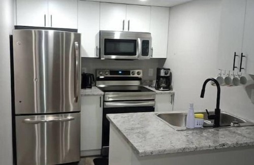 Regina House | New, cozy, one bedroom guest suite.