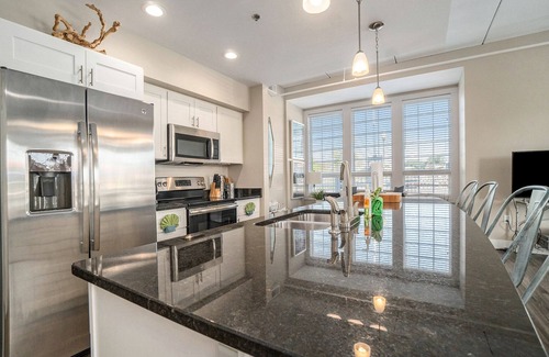 Manistee Condo | New Downtown Riverfront Edgewater Condo