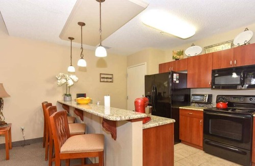 National Gardens Condo | NEW! Harley Retreat Near Beach, Onsite Pool, WiFi!