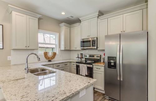 Northport House | New Home in walking distance to local favorite restaurants.