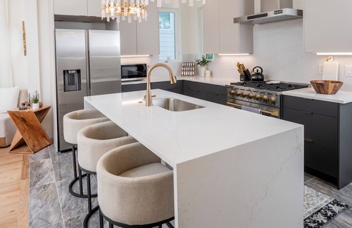 Katie Hill Neighborhood House | NEW HOME - Luxe Skyline Views - 20' Heated Rooftop Pool