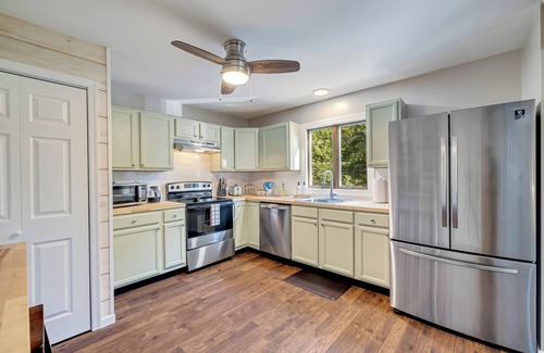 Tunkhannock Township Cottage | New! Hot Tub, Fire-pit, Shuffleboard, Game Room, Kids Play Area and More!