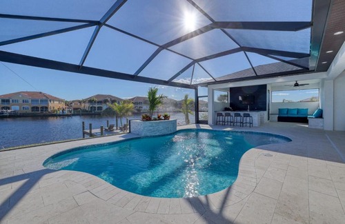 Burnt Store Villa | New listing - Amazing new 3beds/3baths Gulf access villa w. heated pool and outdoor kitchen!