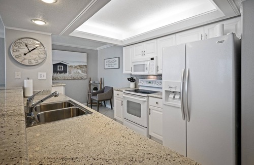 New Smyrna Beach Condo | New listing! Direct oceanfront condo with a balcony, heated pool, and tennis court