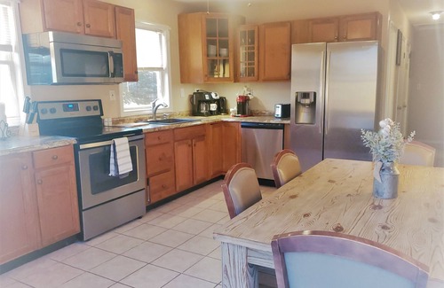 Jewett City House | NEW Listing: LAKEFRONT Home w/Dock, Theater Room, Firepit. Near Mystic, Casinos