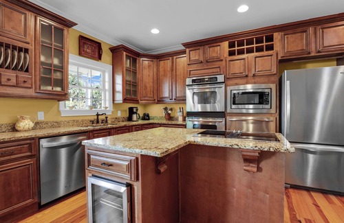 East Beach House | New Listing! Dog Friendly East Beach Home with Private Heated Pool | Steps Away from the Beach!