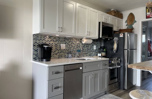 Ocean City Condo | New Lower Rates! Linens and parking included. Short walk to Beach and Boards!