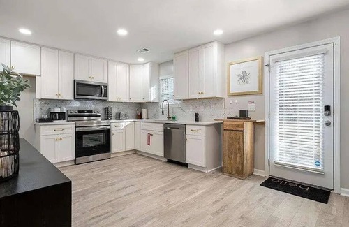 East Point House | New Luxe 4BR Home 5 mins from the Airport with Garage and Upgrades