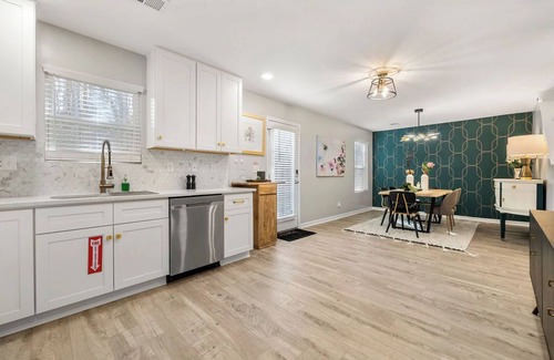 East Point House | New Luxe 4BR Home 5 mins from the Airport with Garage and Upgrades