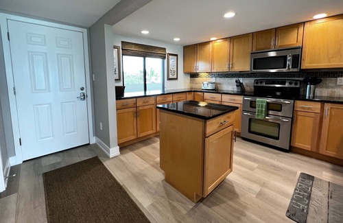Madeira Beach Condo | NEW! Luxuriously Updated & Renovated Beachfront Retreat- Walkable to Fun!