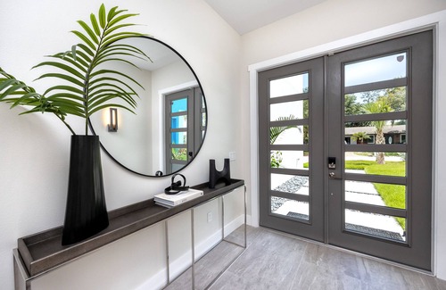 Ridge Wood Heights House | New modern home with salt water heated pool located minutes from SiestaKey Beach