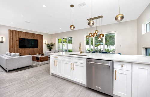 Ridge Wood Heights House | New modern home with salt water heated pool located minutes from SiestaKey Beach