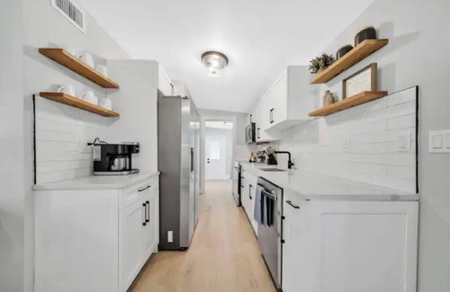 East Naples Cottage | NEW POOL! Naples Home 2 miles to Beach/5th Ave, 2 King Beds, Hot Tub, Bikes