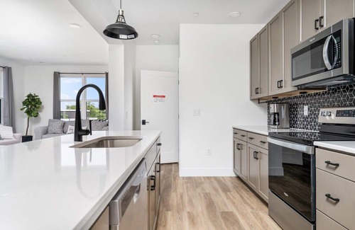 Traverse City Condo | NEW Slabtown Suites 304