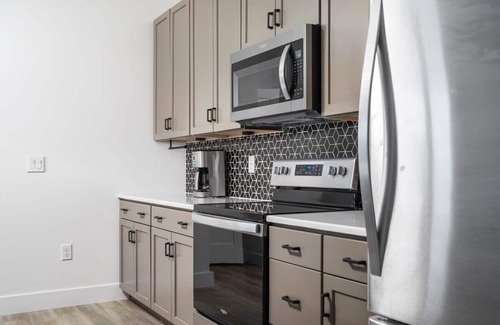 Traverse City Condo | NEW Slabtown Suites 304