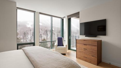 Stowe Area Apartment | New Spruce Peak Tree House Unit Steps To The Lifts With Big Mountain Views Sleeps 9 By Stowe Mountain Rentals