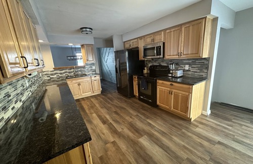 Waldo House | NEW Three bedroom ranch style pet friendly home with a patio & theatre room!