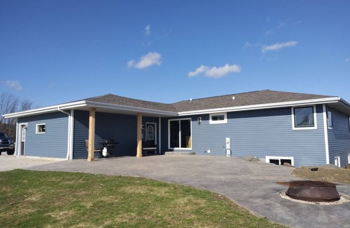Waldo House | NEW Three bedroom ranch style pet friendly home with a patio & theatre room!