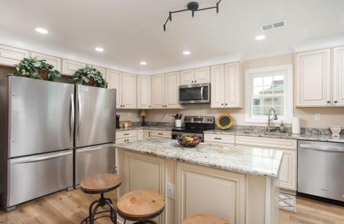Crescent Beach House | New Tropical Getaway with Pool, Games, Steps 2 Beach by myBeach Vacation Rentals