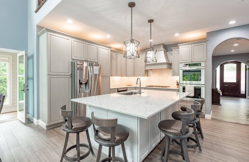 McHenry House | New! Water's Edge Oaks: Lakefront, Dock Slip, Fireplace, Hot Tub!