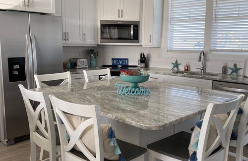 Emerald Isle Condo | Newly Constructed Luxury Condo! Peak Ocean Views, Steps away from Beach, Pool!
