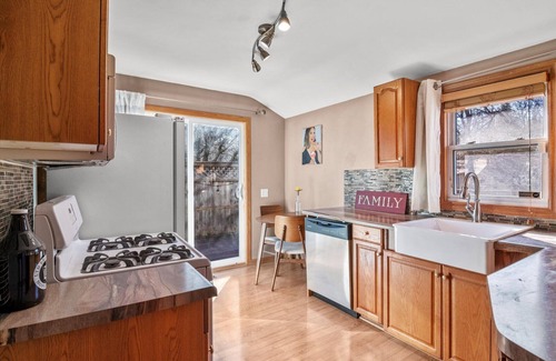 West Side House | Newly furnished home with spacious outdoor deck