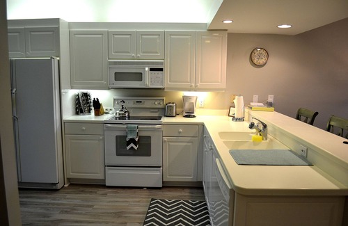 Naples Condo | Newly Remodeled 1st Floor End Unit With Gorgeous Lake Views In Falling Waters!