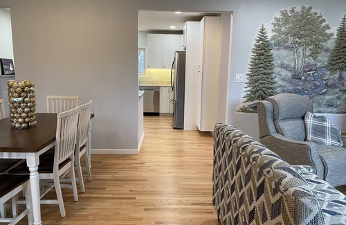 Des Moines House | Newly Remodeled Brick Home with wall Sculptures by the Airport