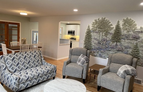Des Moines House | Newly Remodeled Brick Home with wall Sculptures by the Airport