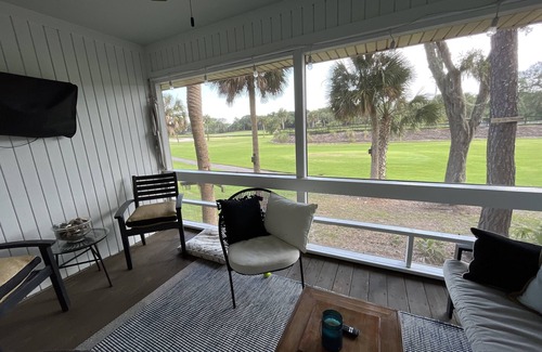 Ocean Ridge House | Newly remodeled-Screened in porch overlooking the 4th tee box.
