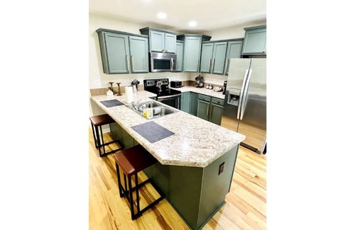 Court House House | Newly Renovated 2 Bedroom, 2 Bath Bungalow!