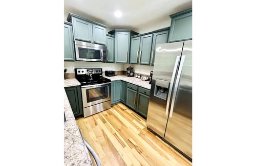 Court House House | Newly Renovated 2 Bedroom, 2 Bath Bungalow!