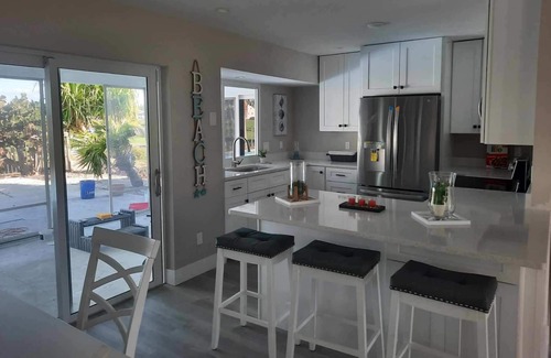 The Dunes House | Newly renovated 2024. Located on golf course with a lake view and pool.