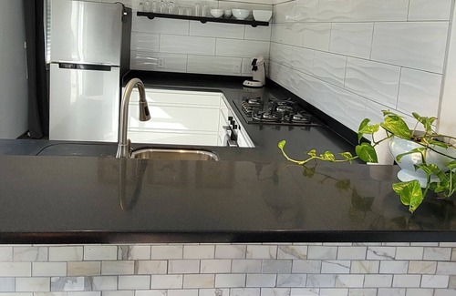 Upper Prince's Quarter Apartment | Newly renovated apartment with 10 min drive to 6 beaches!