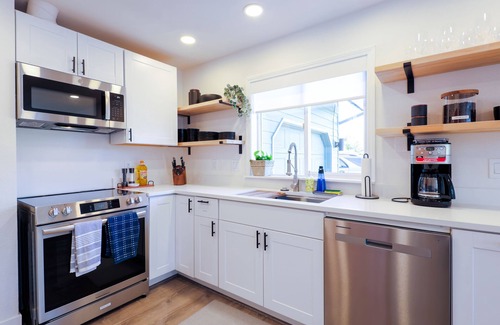 Eugene House | Newly renovated, centrally located home with private gate, RV parking & Hot Tub