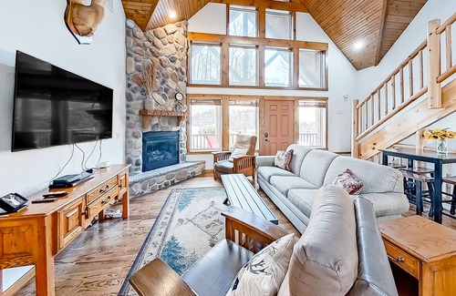 Indian Point Cottage | Newly renovated home with fantastic game room, fireplace, pool & hot tub