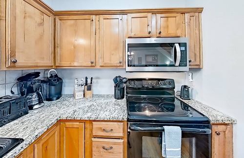 Indian Point Cottage | Newly renovated home with fantastic game room, fireplace, pool & hot tub