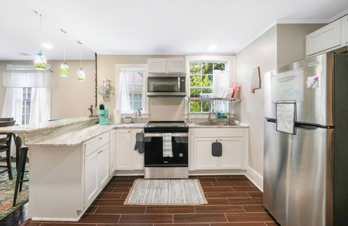Montgomery House | Newly renovated Victorian home with beautiful features in quiet neighborhood.