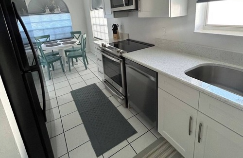 Caloosahatchee Condo | Newly updated 2/25 2-bedroom 2 bath condo with 3 steps to the Pool in Cape Coral