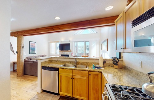 Saddle Ridge House | Newly updated condo with ski-In/ski-out access, a private hot tub & more