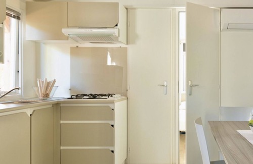 Marina di Montalto House | Nice and welcoming mobile home located near the beach with air conditioning of approximately 32 m2 composed of a living room, kitchenette with gas stove, fridge with freezer, pots and pans.A bedroom with a double bed and two other bedrooms with two singl