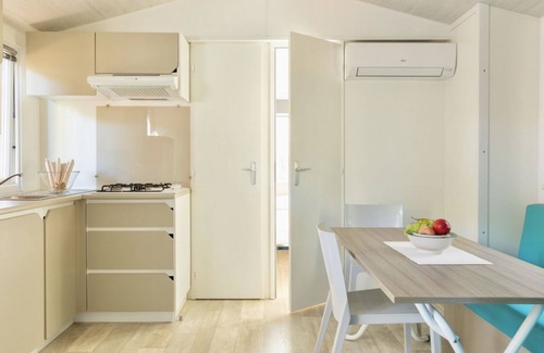 Marina di Montalto House | Nice and welcoming mobile home located near the beach with air conditioning of approximately 32 m2 composed of a living room, kitchenette with gas stove, fridge with freezer, pots and pans.A bedroom with a double bed and two other bedrooms with two singl