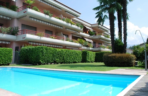 Caslano Apartment | Nice apartment for 4 guests with pool, WIFI, TV, patio, pets allowed and parking