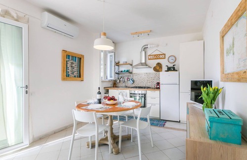 Marina di Cecina Apartment | Nice apartment for 4 guests with WIFI, A/C, TV, balcony, pets allowed and parking